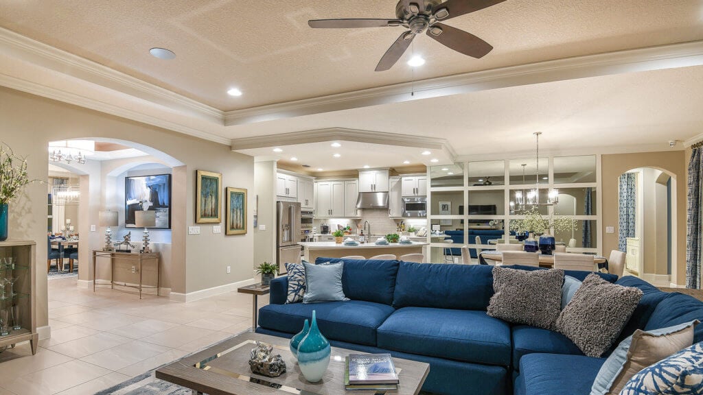 See home lighting examples in person by touring a model home today. This is a photo shares the lighting int the family room of the Abaco Model at WaterGrass in Wesley Chapel, FL 33545