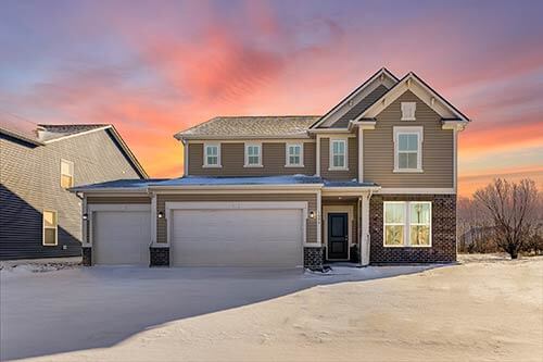Legacy 3040 model with 6 bedrooms, 3-car garage, and two-story layout in snowy Danville setting
