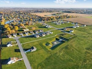 Bird’s-eye view of Grand Oaks residential community in Mooresville with homes and community green space